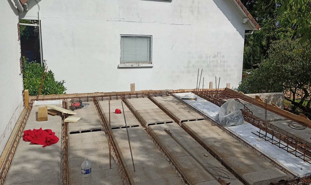Plancher en poutrelles hourdis béton